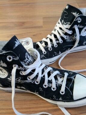 Converse women’s 7 Black High-Top Sneakers with White Graphic Print